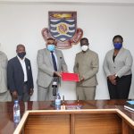UCC MoU Prof. Joseph Ghartey Ampiah third from right exchanging the signed document with Mr Lalit Mishra third left. With them are both officials of UCC and Park Agrotech Ghana Limited